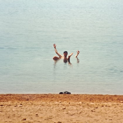 Photo of me bobbing in the Dead Sea in 1995.